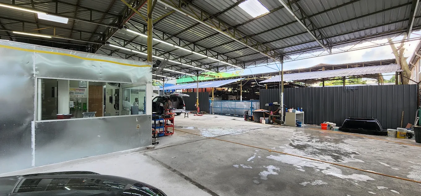 The work area inside Speedy Spray’s USJ 1 body and paint workshop